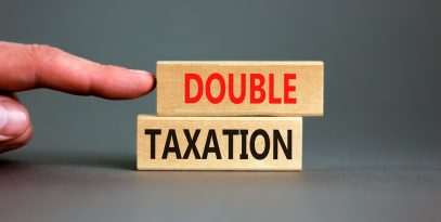 double,taxation,symbol.,concept,words,double,taxation,on,wooden,blocks