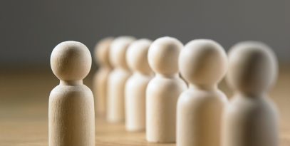 close,up,group,wood,person,human,alike,on,brown,background,